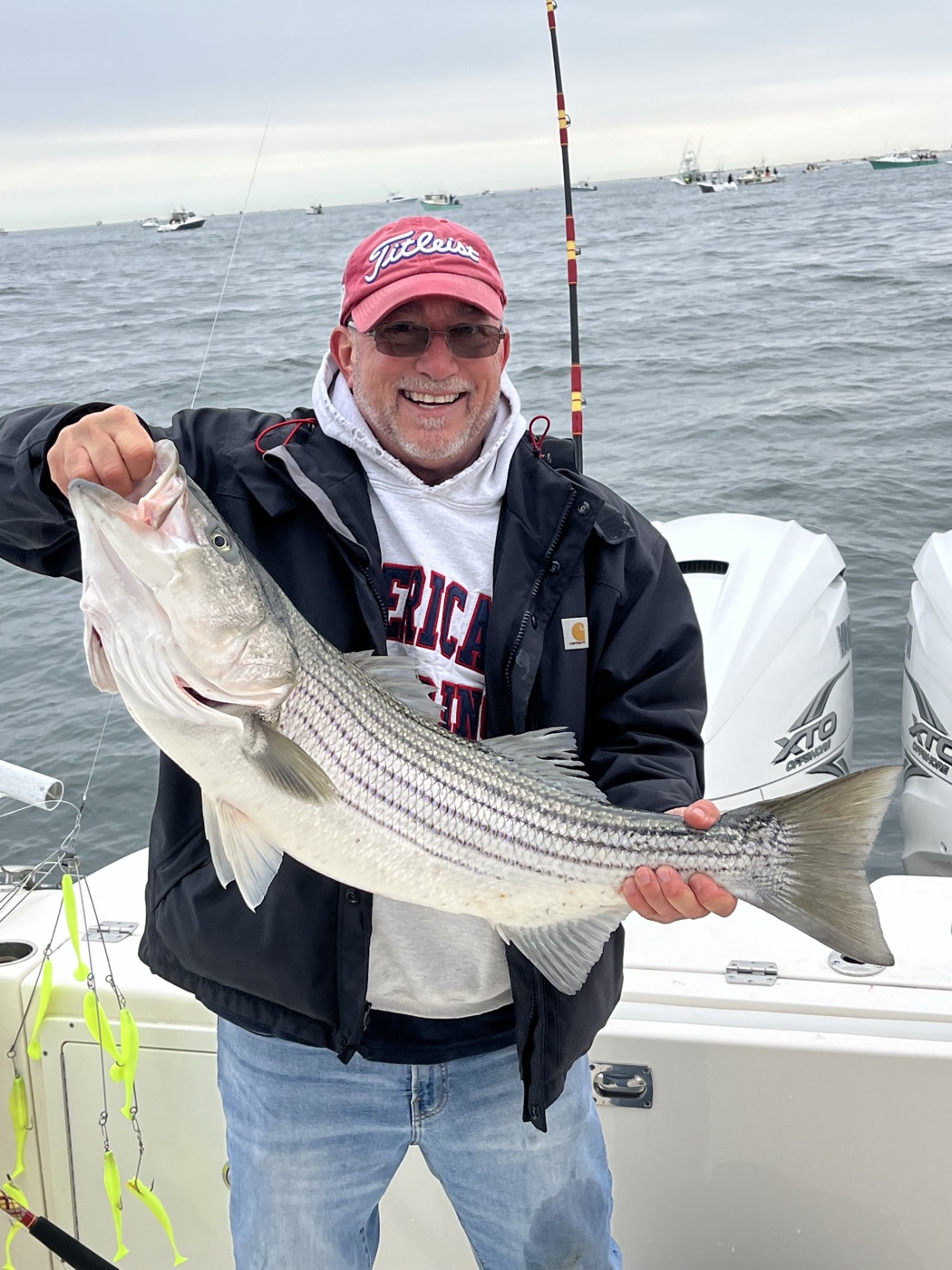 Angler with a big striped bass